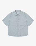 Front flat shot of Uskees pale blue-grey short-sleeve Technique trekking shirt for men indicating relaxed fit.