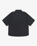 Back view flat shot of Uskees black Technique trekking shirt for men showing mesh layers under arms and back vent.