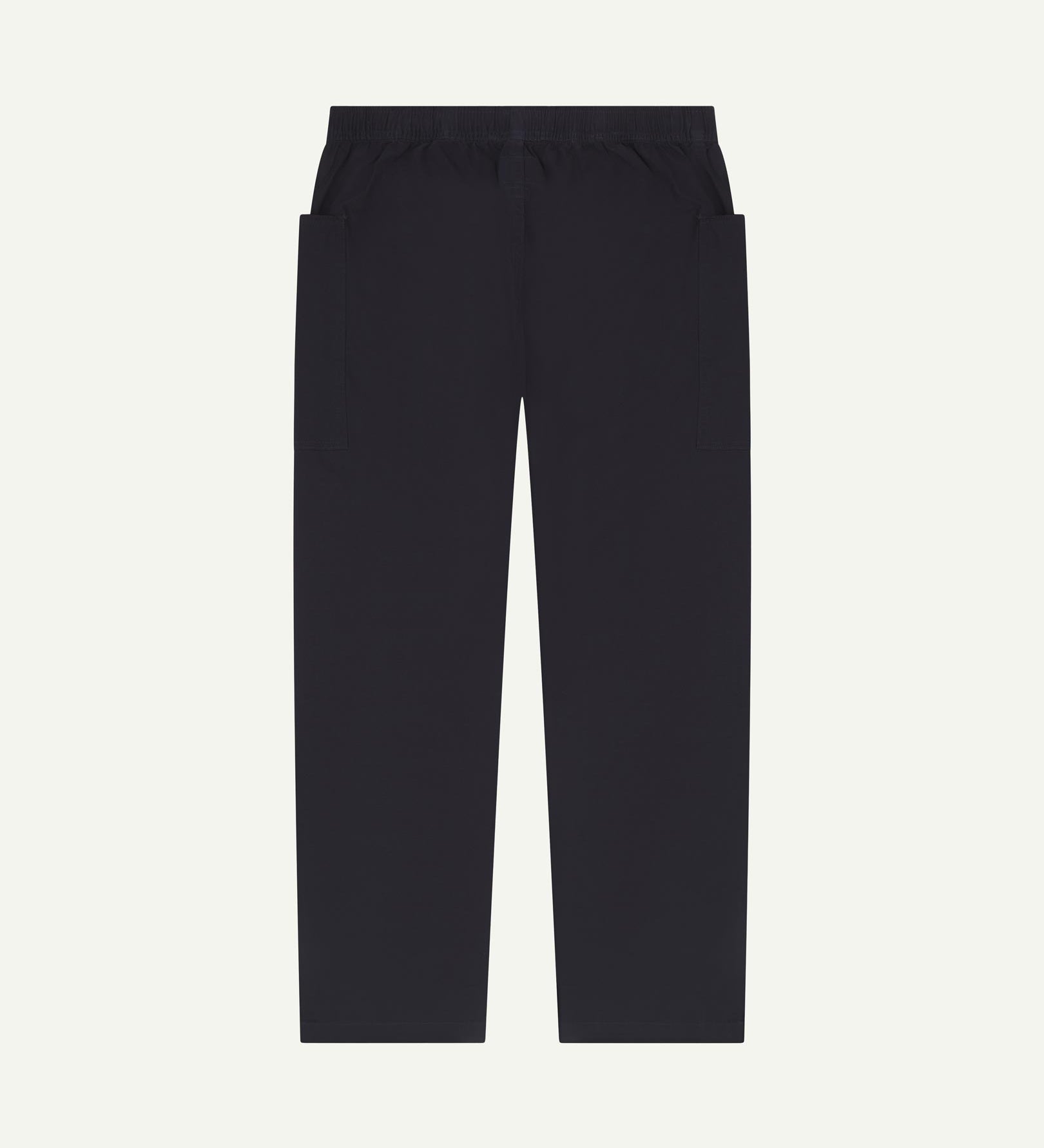 Full length back flat shot of midnight blue green lightweight cotton 5011 trousers showing the deep pockets and the relaxed, tapered fit on the leg.