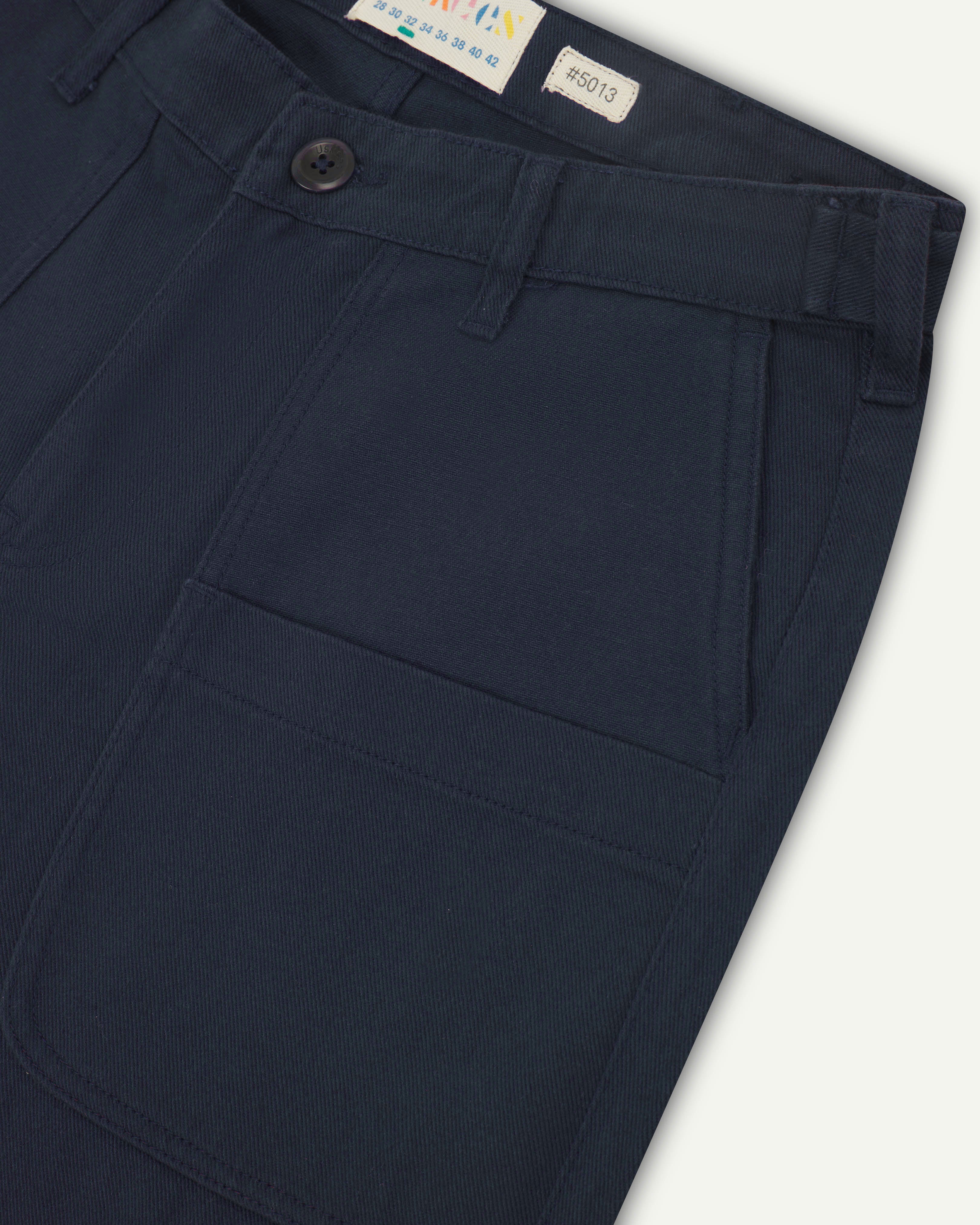 Close up shot of uskees #5013 drill men's trousers showing pocket and waistband detail