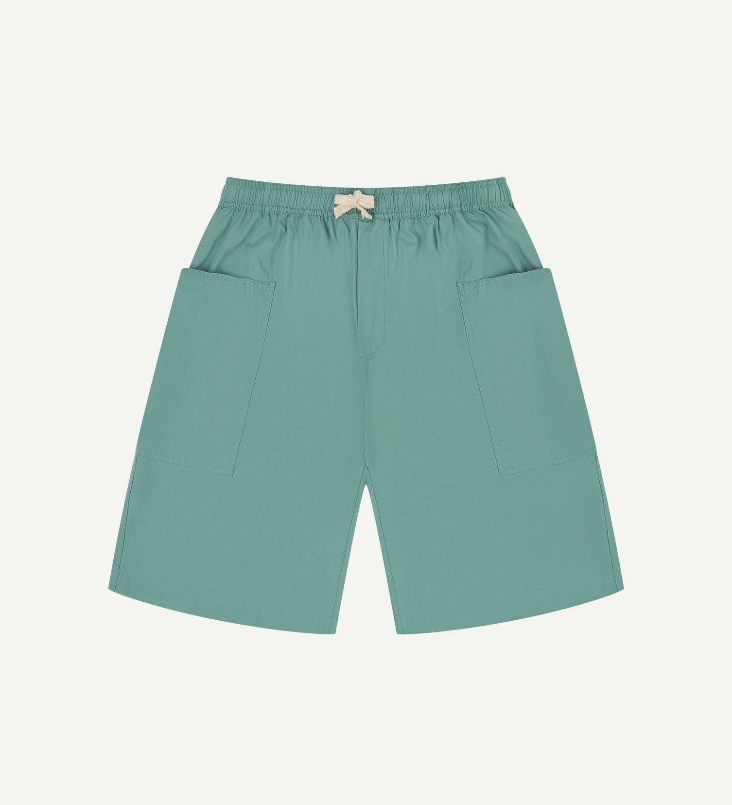 Front flat view of eucalyptus-green organic cotton #5015 lightweight cotton shorts by Uskees. Clear view of drawstring and deep front pockets.