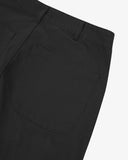 Close-up reverse view of Uskees black twill pants with focus on left rear pocket and belt loops.