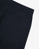 Close up view of view of 5016 Uskees men's cotton twill midnight blue 'commuter' trousers showing the back pocket detail