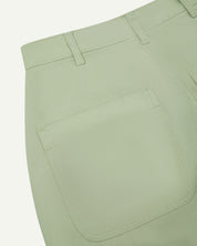 Close-up reverse view of Uskees silver-grey heavyweight drill work pants with focus on left rear pocket and belt loops.