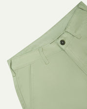 Close-up front view of the left-front pocket detail and belt loops of the silver-grey heavyweight drill pants.