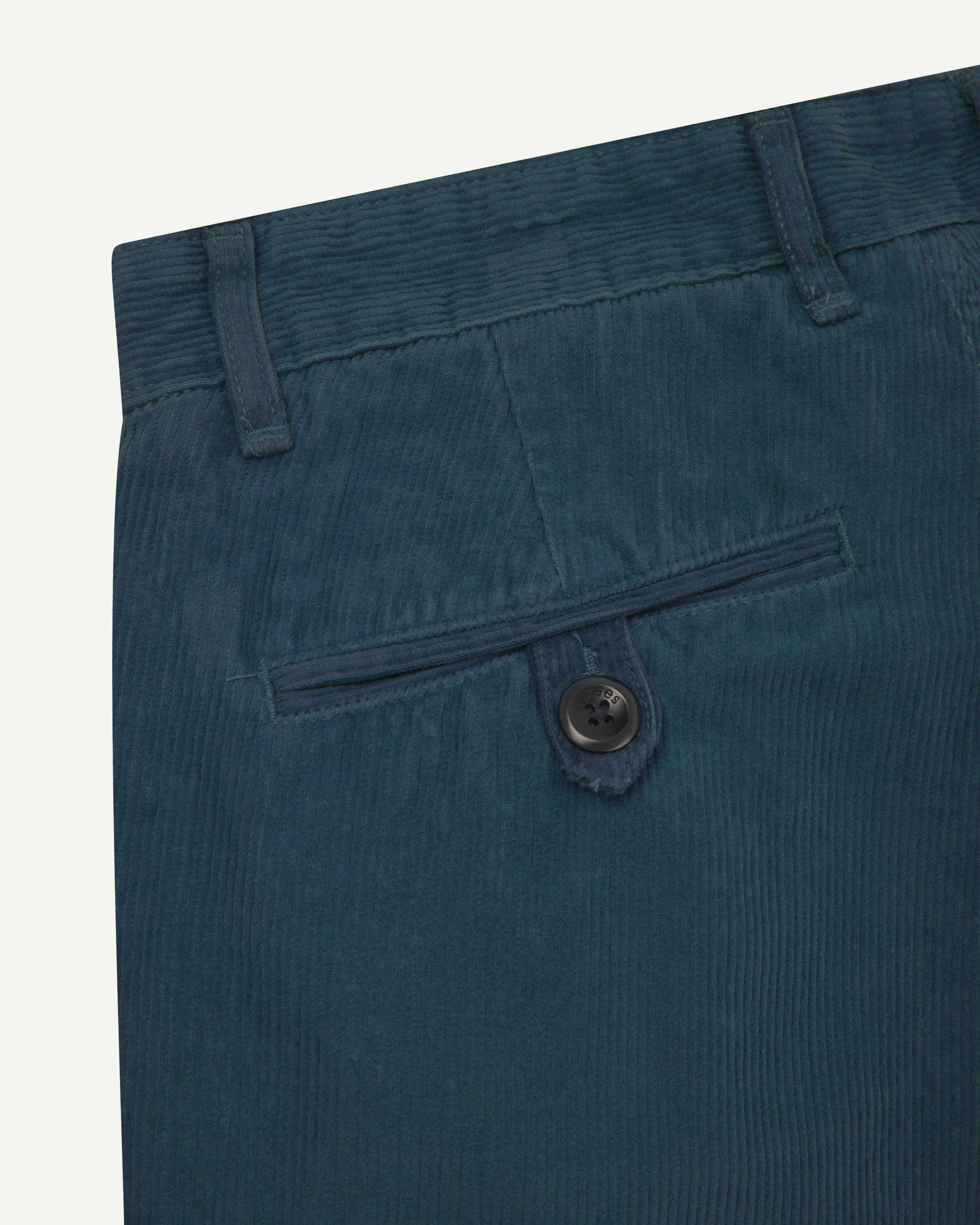 Close up back shot of Uskees 5018 cord boat pants in petrol blue.