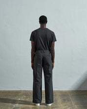 Full-length back view of model wearing #5018, charcoal-grey mid-weight cotton boat pants. Showing rear pockets, belt loops and vintage inspired silhouette.