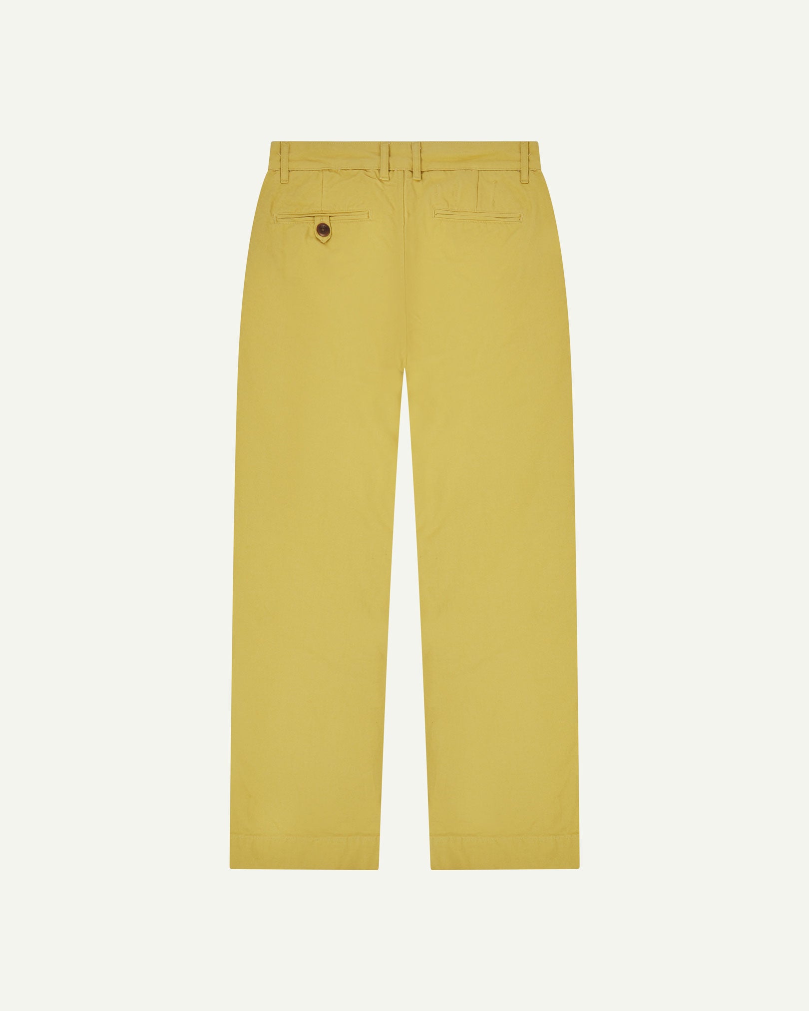 Back view of 5018 Uskees men's organic mid-weight cotton boat trousers in acid yellow (citronella) showing wide leg style and buttoned back pocket.