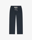 Front flat view of 5020 drill utility pants in blueberry. Indicating tapered fit on the leg, deep front pockets and reinforced knee patches. 