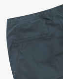 Close up view of the jetted back pocket and the waistband of the blueberry ripstop pants from Uskees.
