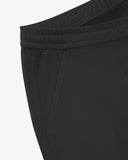 Close up view of the pocket of the charcoal grey drill pants from Uskees.