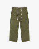 Front flat view of 5020 ripstop utility pants in ivy green. Indicating drawstring, tapered fit on the leg, deep front pockets and reinforced knee patches. 