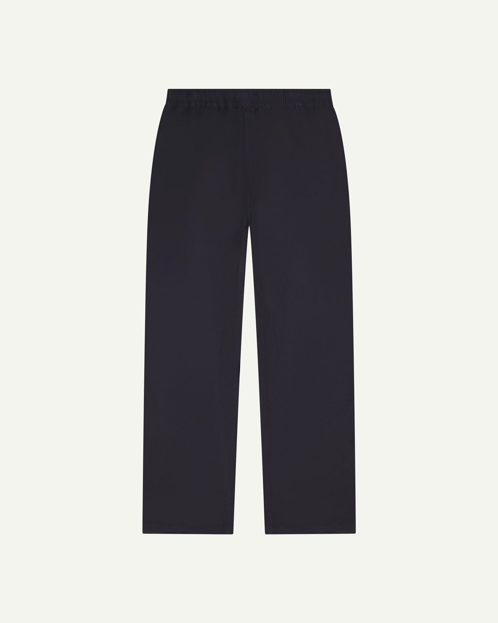 Flat back shot of the Uskees 5020 lightweight utility pants in midnight blue showing drawstring waist and slighly tapered cut.