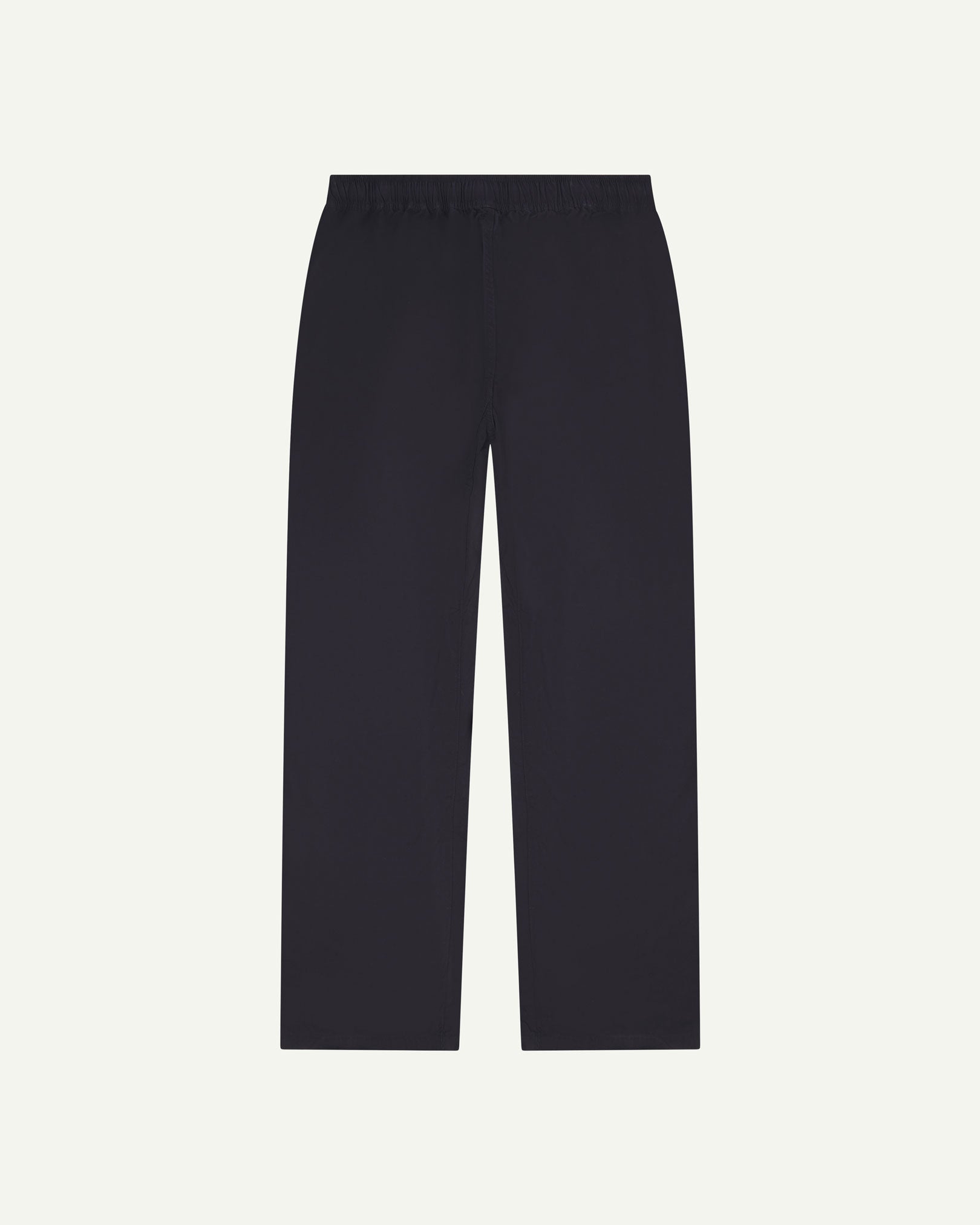 Flat back shot of the Uskees 5020 lightweight utility pants in midnight blue showing drawstring waist and slightly tapered cut.