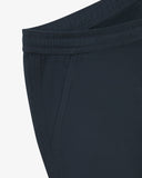 Close up shot of Uskees cotton drill blueberry utility pants for men showing the pocket detail.