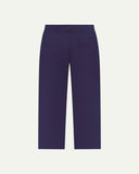 Back flat view of Uskees 5022 barrel leg pants in deep indigo showing cinch strap, belt loops, back pockets and flattering silhouette.