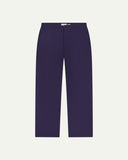 Front flat view of Uskees barrel leg pants in deep indigo. Showing Corozo button fastening, baggy fit with tapered cuff.