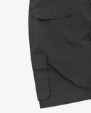 Close-up back flat view of 5023 ripstop cargo shorts in black. Focus on left flap pocket and left cargo pocket.
