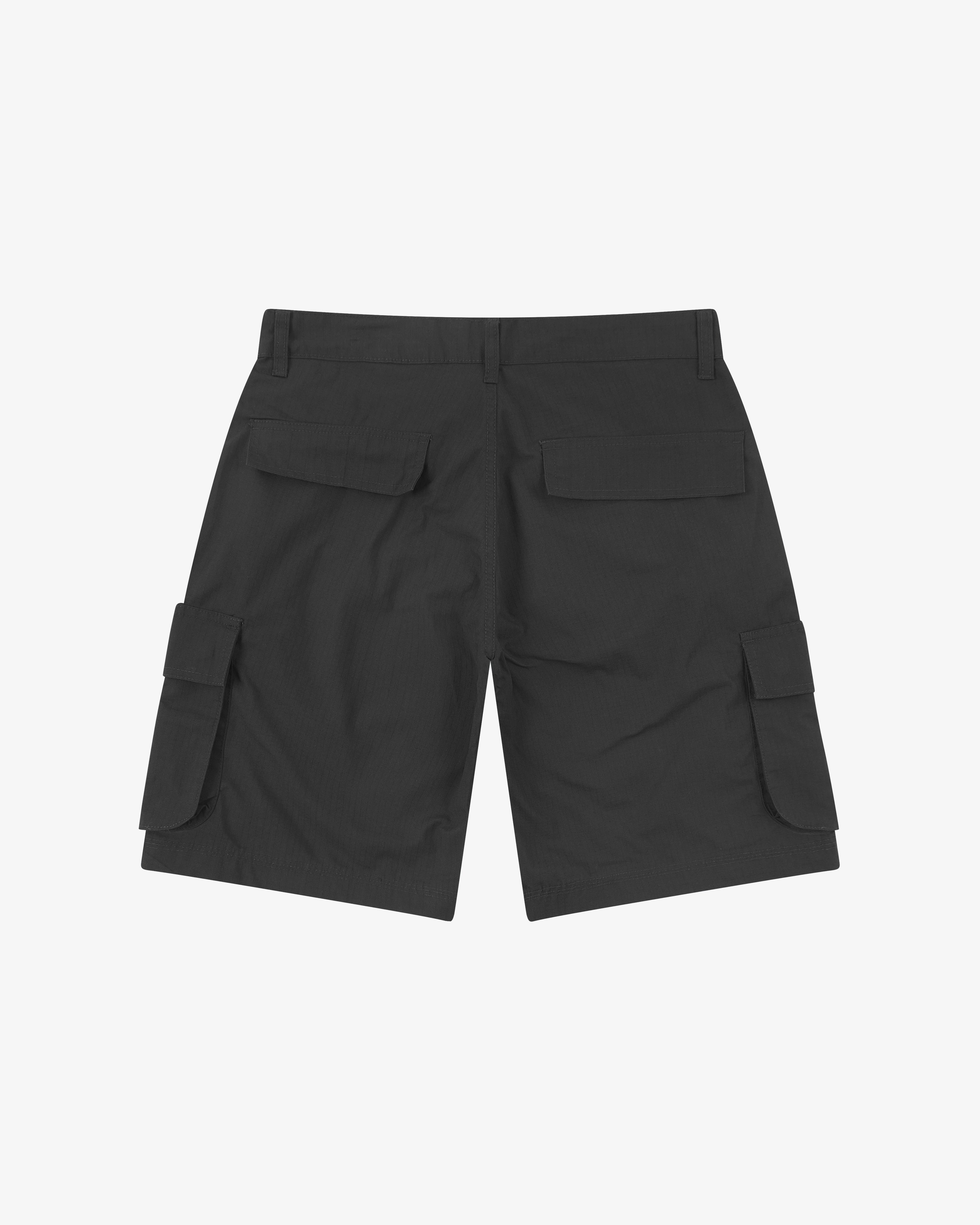 Back view of black men's 5023 ripstop cargo shorts by Uskees. Clear view of the two flapped welt pockets, belt loops and partial view of the two cargo pockets.
