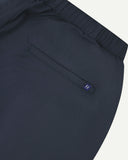 Close-up back view of blueberry 5024 men's ripstop utility shorts. Clear view of jetted back pocket, Uskees logo label and elasticated waistband.