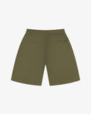 Back flat view of 5024 ripstop utility shorts in ivy green. Indicating relaxed fit, two jetted pockets and small uskees tab label on right pocket.