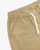 Close up front view of the front side pocket, elasticated waist and drawstring of the khaki ripstop shorts from Uskees.