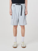 Bottom-half view of model wearing Uskees 5026 pale blue-grey Technique trekking shorts indicating relaxed fit.