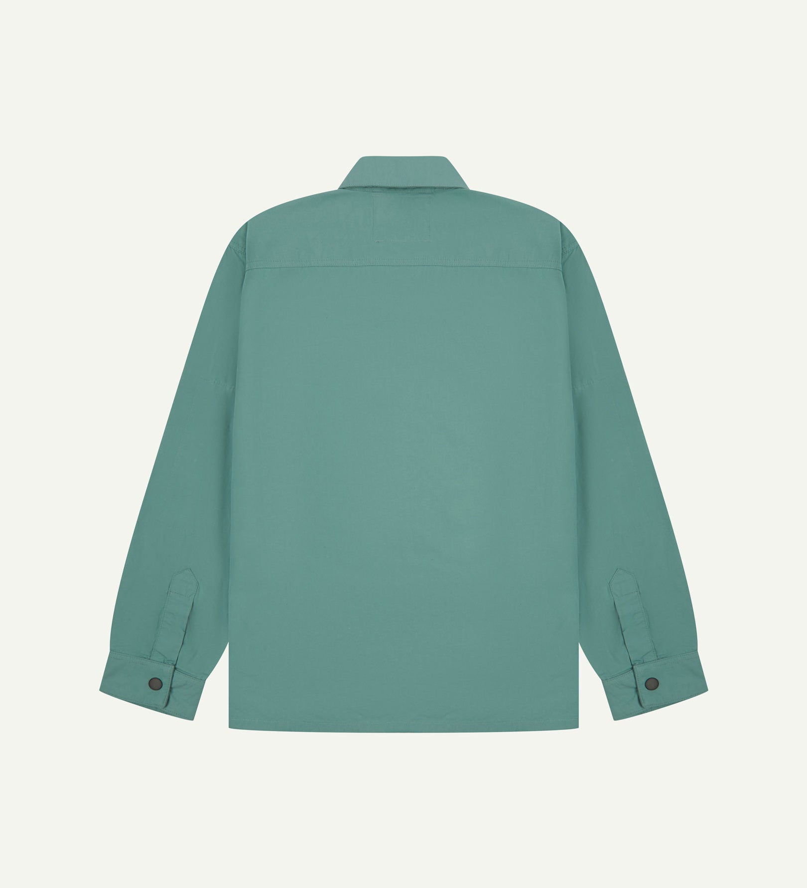 Reverse view of blue-green eucalyptus, lightweight overshirt showing reinforced elbows, boxy silhouette and 'popper' cuffs.
