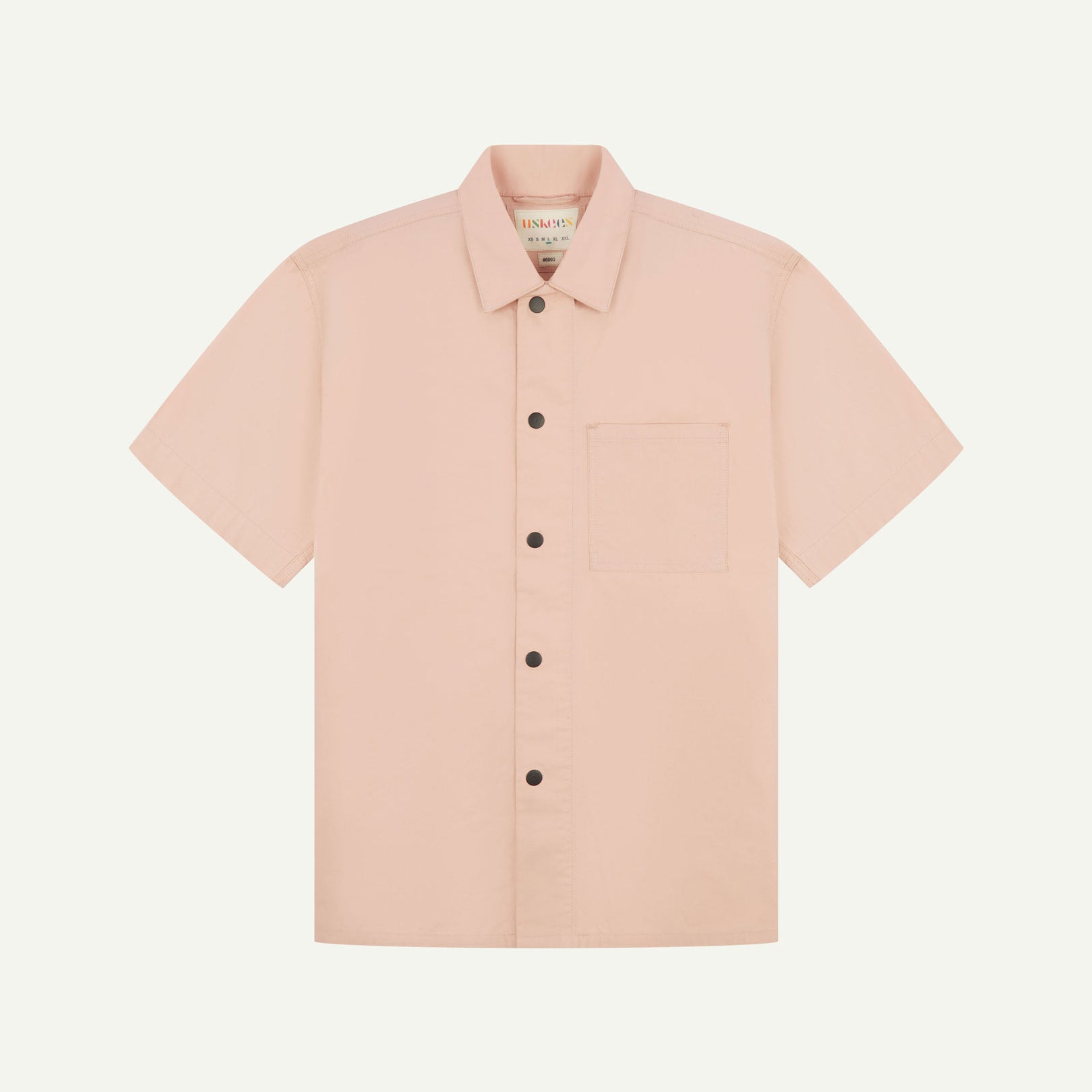 Front flat view of dusty pink buttoned organic cotton lightweight short sleeve shirt from Uskees.