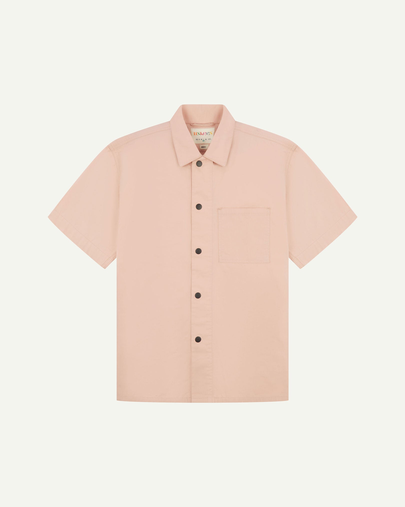 Front flat view of dusty pink buttoned organic cotton lightweight short sleeve shirt from Uskees.