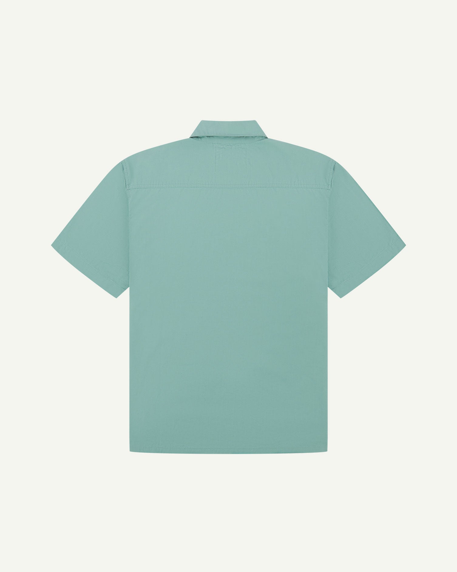 Reverse flat view of eucalyptus-green lightweight short sleeve shirt from Uskees.