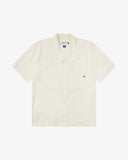 Front flat shot of Uskees cream linen blend short-sleeve Cuban shirt on a white background