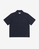 Front flat view of Uskees Tasker buttoned short sleeve shirt with deep blue organic cotton waffle fabric.