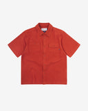 Front flat view of Uskees Tasker buttoned short sleeve shirt with rust-red organic cotton waffle fabric.