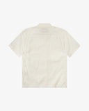 Back flat shot of Uskees cream linen blend short-sleeve shirt for men on a white background