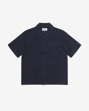 Front flat view of Capri Camp buttoned short sleeve shirt from Uskees with deep blue organic cotton waffle fabric.