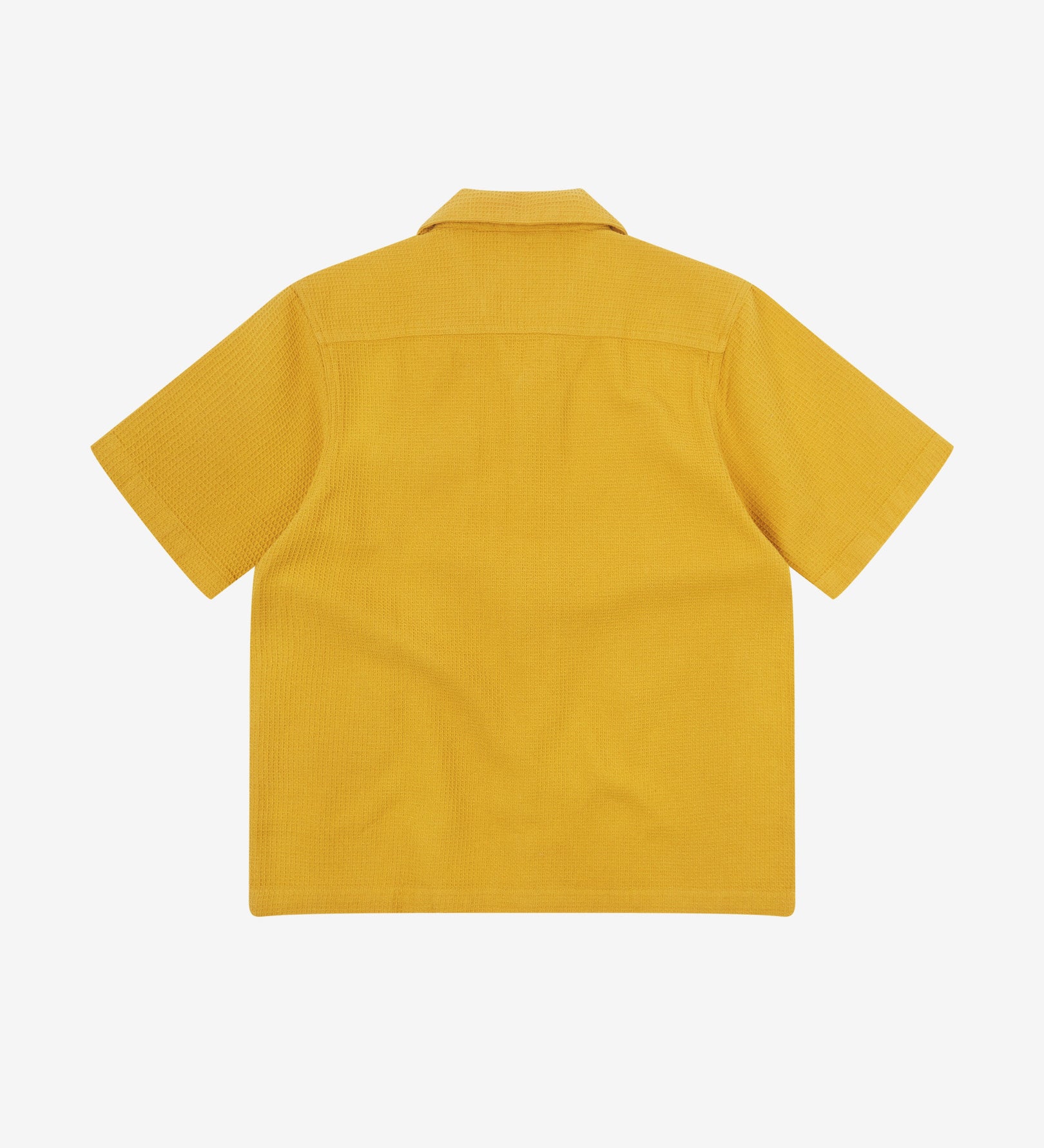 Reverse flat view of yellow organic cotton waffle fabric short sleeve shirt from Uskees showing loose, relaxed style.