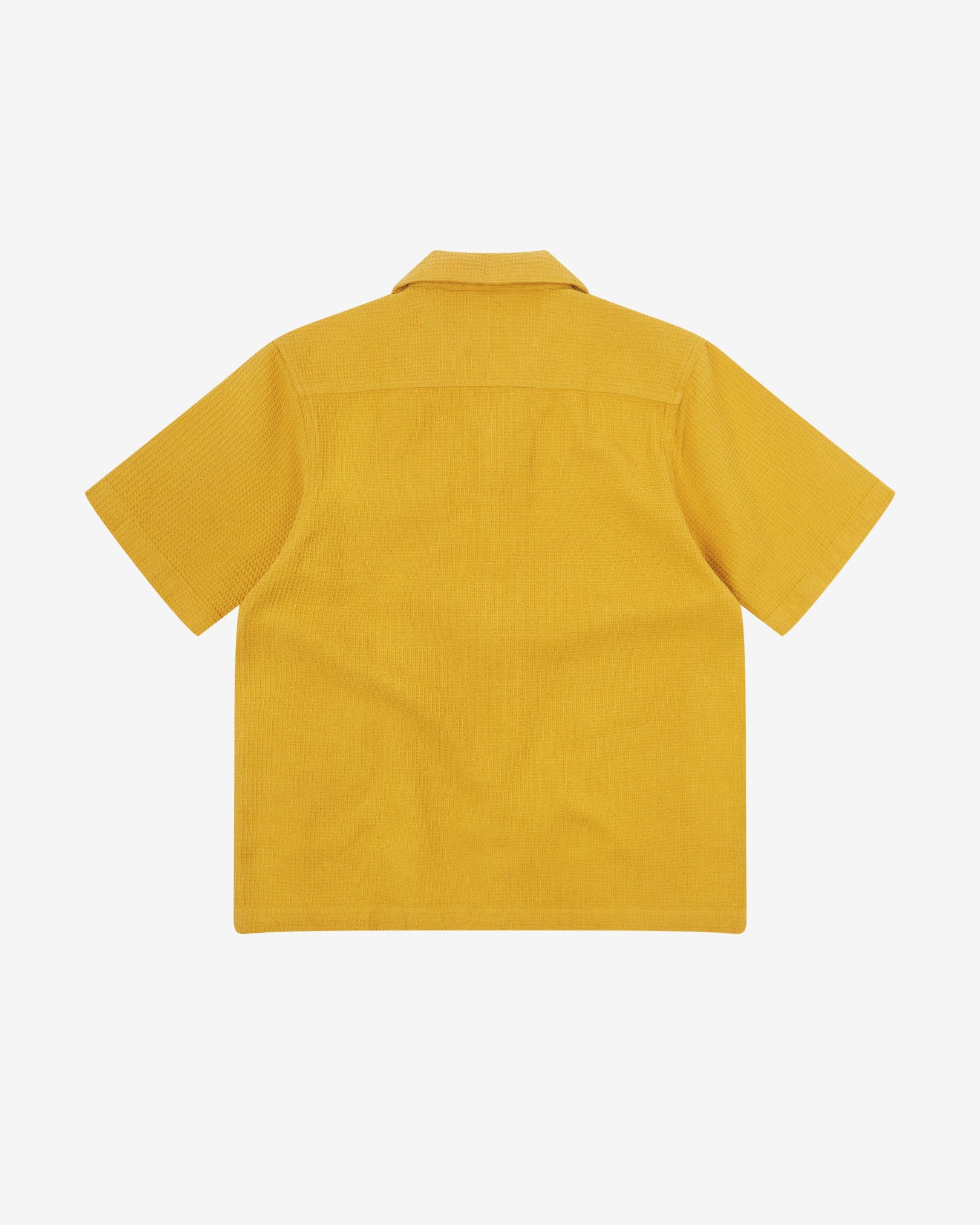 Reverse flat view of yellow organic cotton waffle fabric short sleeve shirt from Uskees showing loose, relaxed style.