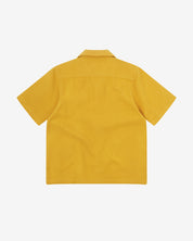 Reverse flat view of yellow organic cotton waffle fabric short sleeve shirt from Uskees showing loose, relaxed style.