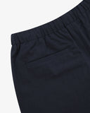 Back view close up shot of Uskees dark blue shorts for men showing the left back pocket.