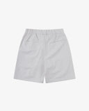 Back view flat shot of Uskees off-white shorts for men with view of two welt pockets.