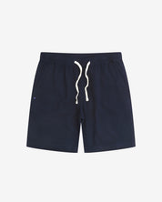 Front view of deep-blue #6009 waffle cotton shorts. Clear view of white drawstring, side pockets and small Uskees tag label.
