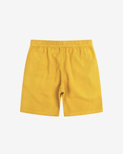 Back view of yellow #6009 waffle cotton shorts by Uskees with clear view of lightweight elasticated waistband.