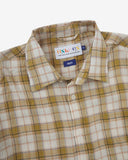 Uskees sand pebble plaid lumberjack shirt with a visible Uskees brand label at neck, hanging loop and multi coloured pattern.