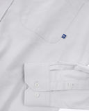 Uskees white men's Oxford shirt showing the buttons, cuff and weave.