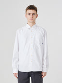 Upper body view wearing Uskees white men's Oxford shirt.