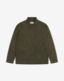 Flat shot front of Uskees wax storm jacket in dark 'Pennine' green showing the boxy silhouette and all the features which make this an effective weather-repellent garment. 