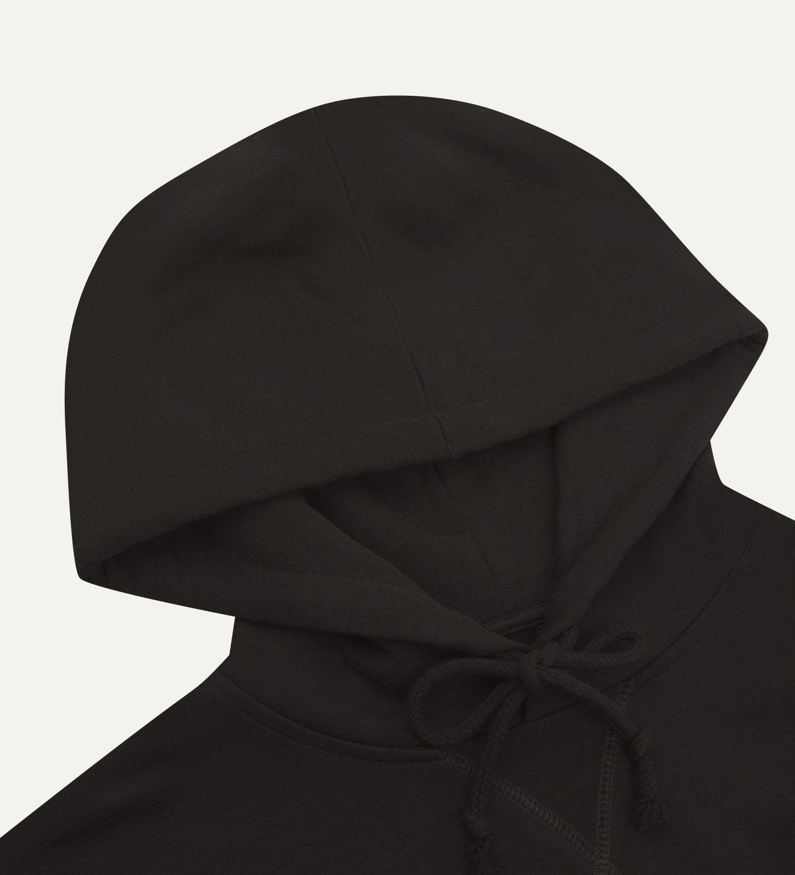 Close up front shot of Uskees signature faded black men's hooded sweatshirt showing the hood and drawstring detail.