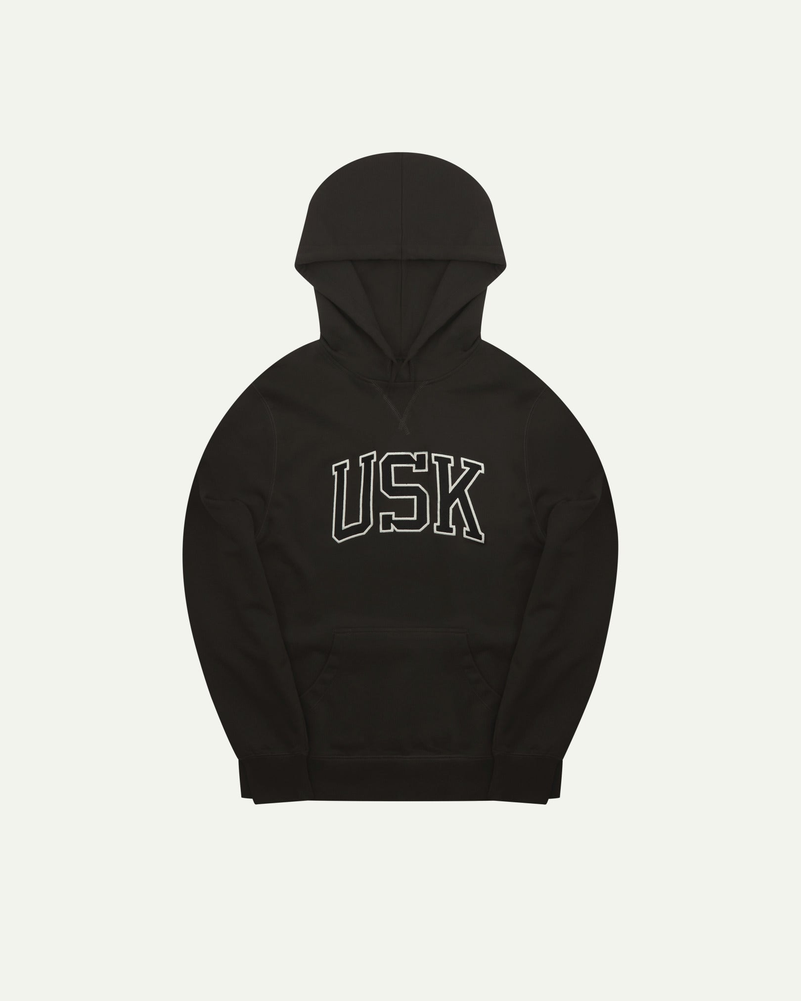 Front flat shot of Uskees signature faded black men's hooded sweatshirt showing the 'USK' logo and hood.