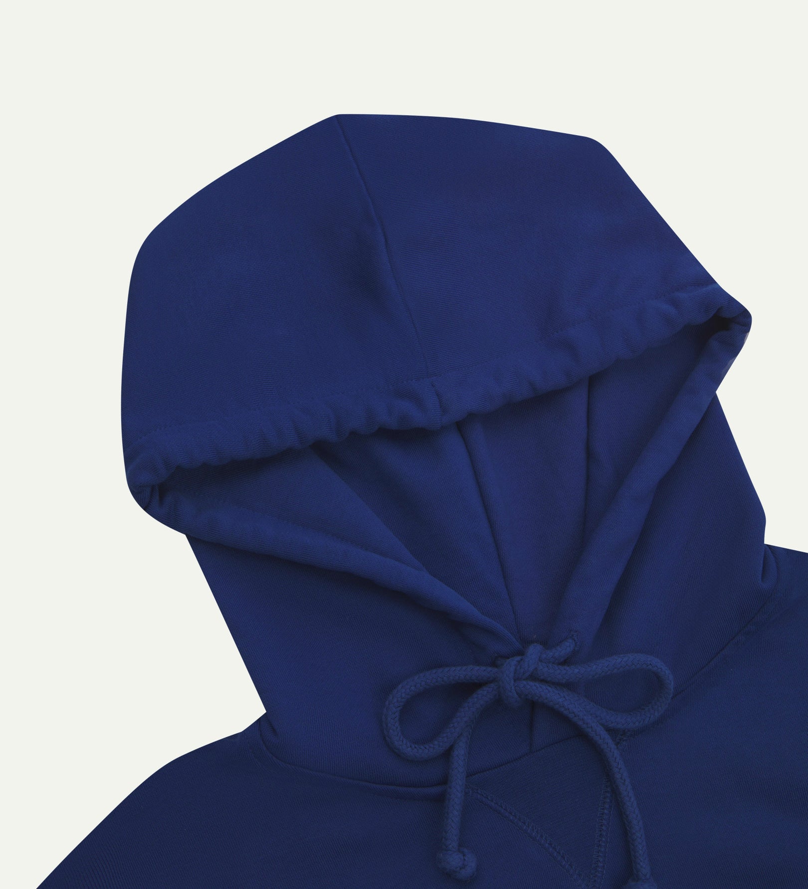 Front close up shot of Uskees signature ultra blue men's hooded sweatshirt showing the hood and neck drawstring detail.